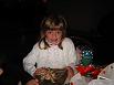 Paige about to unwrap her ornament.
